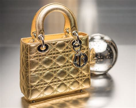 dior bag black and gold|Dior gold handbag.